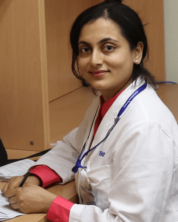 Dr. Anuradha Yadav, Plastic Surgeon at Yadav Super Speciality Hospital, showcasing her qualifications: MBBS, DNB Plastic., MNAMS, Fellowship in Breast Surgery (Chelmsford, UK), Fellowship in Ear Reconstruction (Seoul, South Korea).