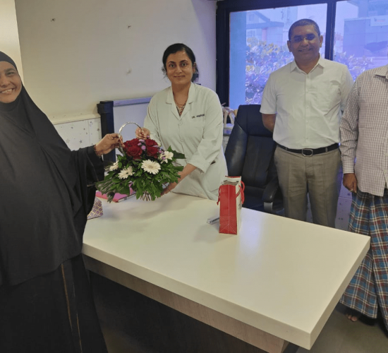 Dr. Anuradha Yadav receiving gratitude from recovered patients