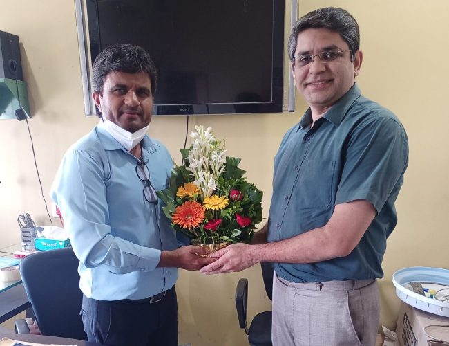 Dr. Jayesh Yadav receiving gratitude from recovered patients
